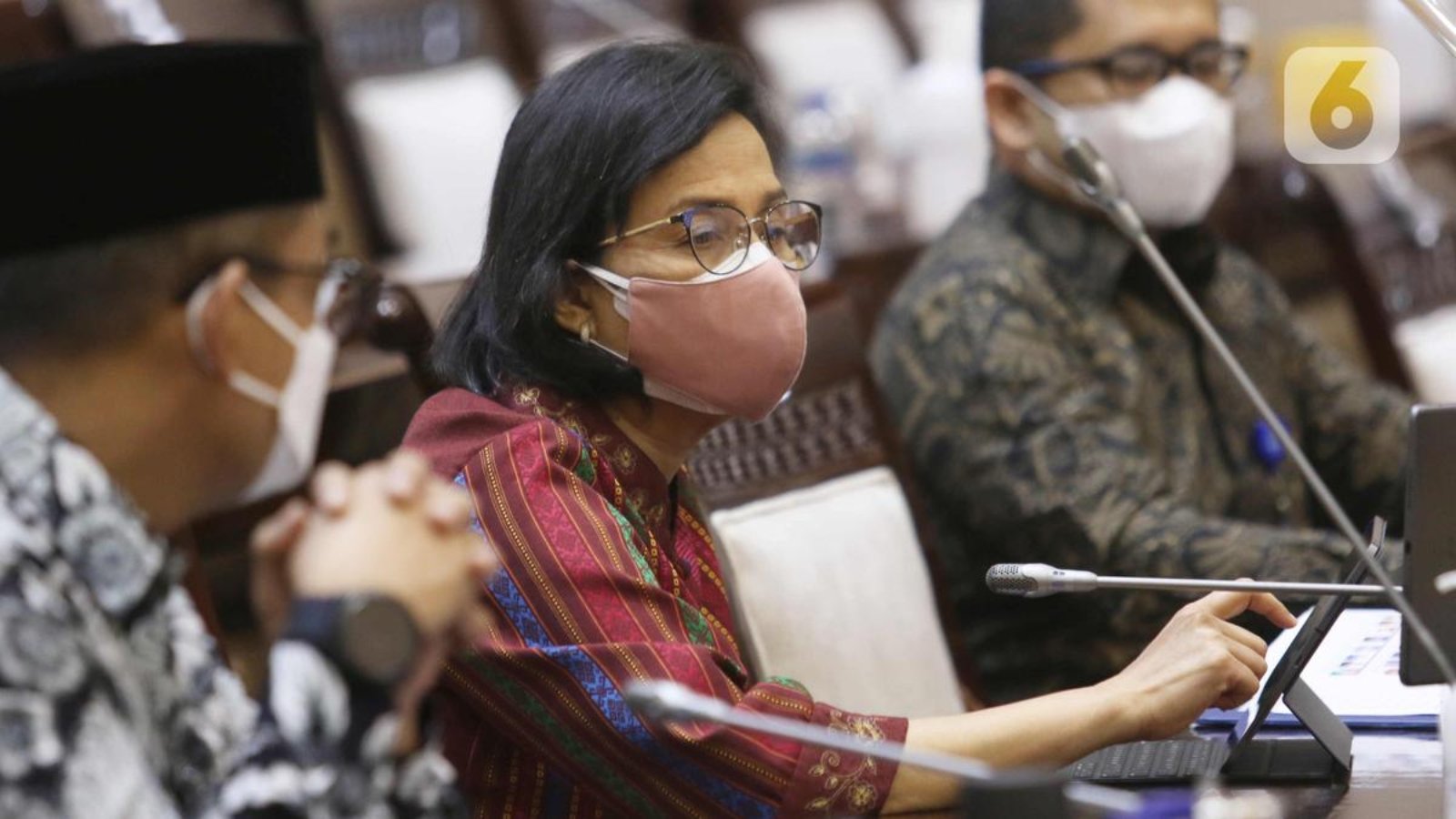 034691200_1615807204-20210315-Menkeu_Sri_Mulyani_Beberkan_Perubahan_Pengelompokan_Skema_Barang_Kena_Pajak-4.jpg