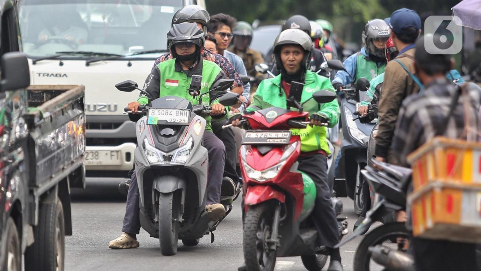 024386100_1751539843-20250703-Kenaikan_tarif_Ojol-ANG_2.jpg